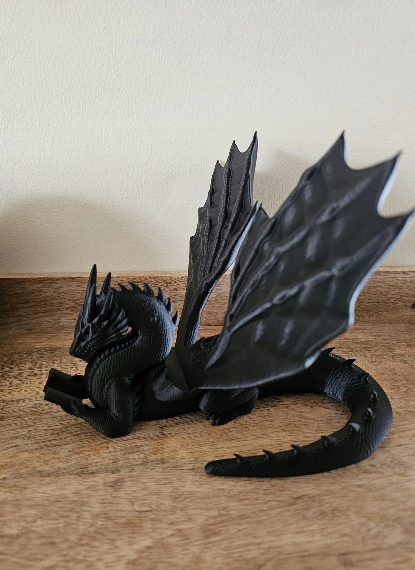Dragon kindle stand